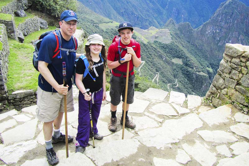 Children enjoying the adventure of visiting Machu Picchu