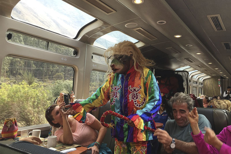 Saqra dancing for train passengers Show on the train to Machu Picchu