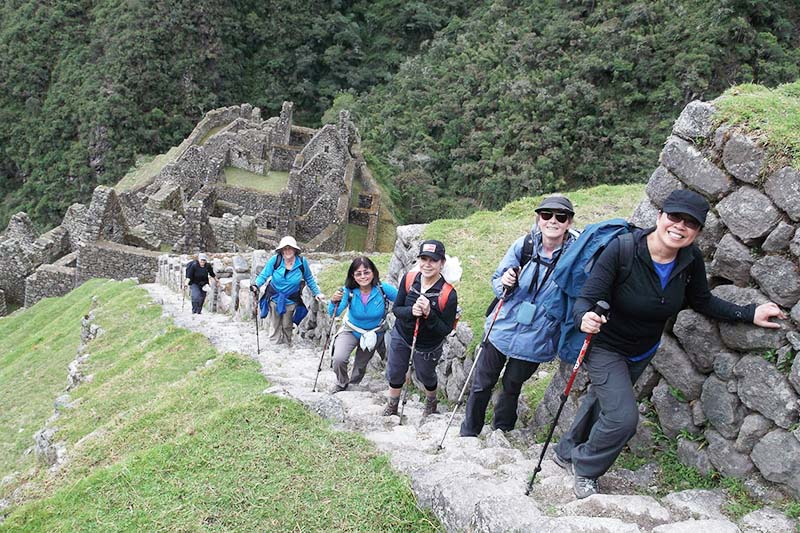 Tourists climbing Huayna Picchu mountain