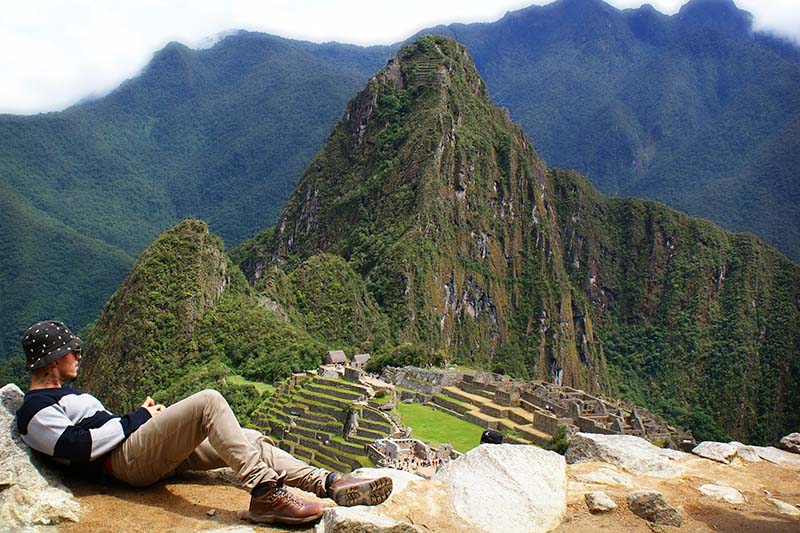 Resting in Machu Picchu Tourist resting in Machu Picchu