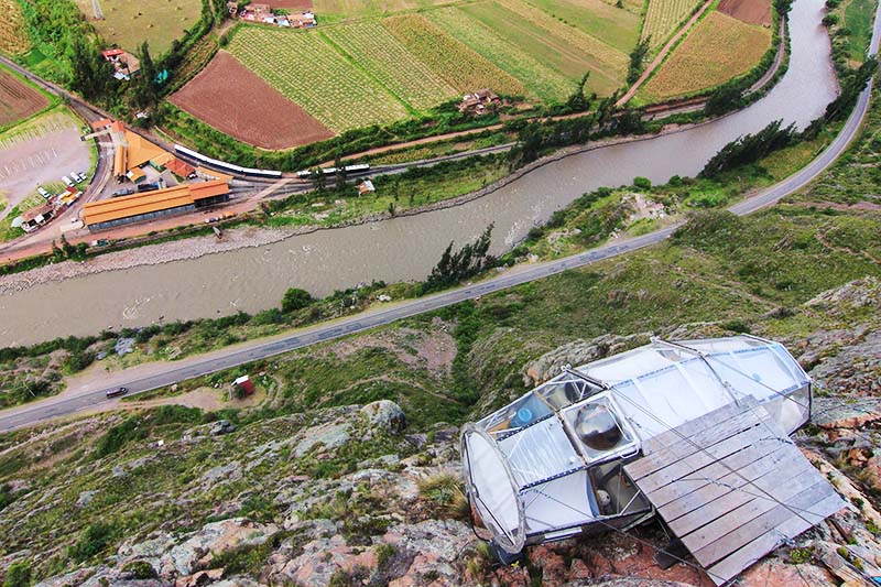 Glass capsule hanging above the Urubamba River in the Sacred Valley