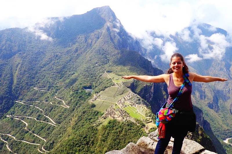 Huayna Picchu Tourist at the top of the mountain Huayna Picchu