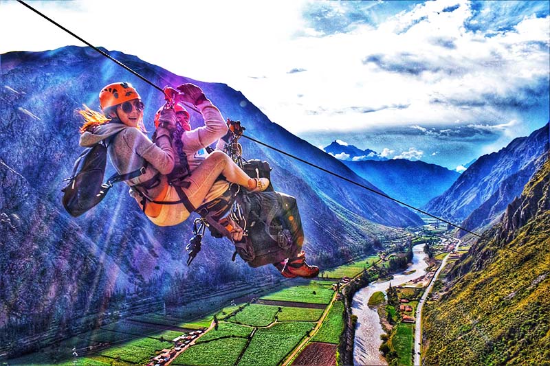 Tourists practicing ziplining in the Sacred Valley