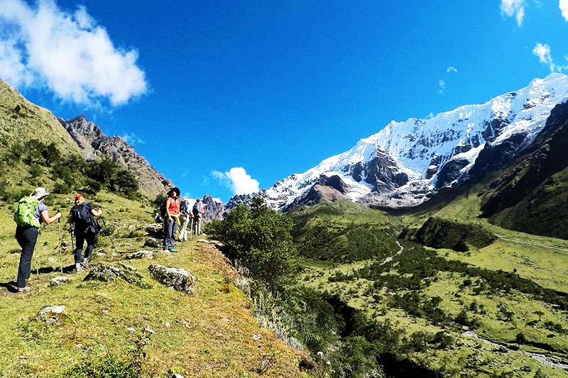 Trekking through Salkantay Tourist trekking through Salkantay mountain
