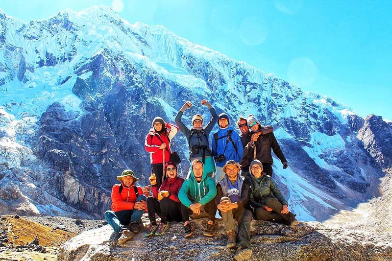 Trek Salkantay Tourists at the foot of the Salkantay mountain