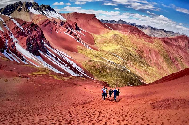 Red valley Tourists in the Red Valley of Pitumarca