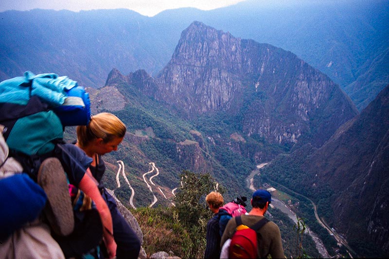 Tourists descending the Inca Trail towards Machu Picchu