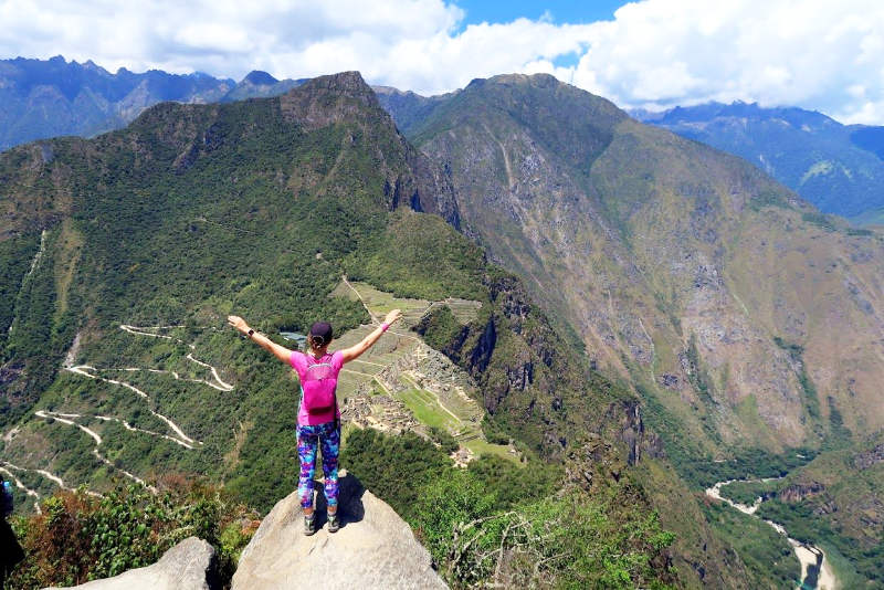 Tourist on the summit of Huayna Picchu
