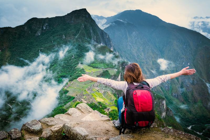 Tourist on the summit of Huayna Picchu