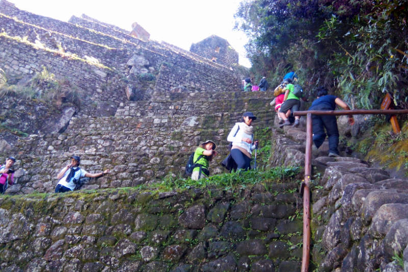 Tourists climbing Huayna Picchu