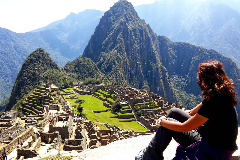 Tourist observing the Inca citadel from the Guardian's House.