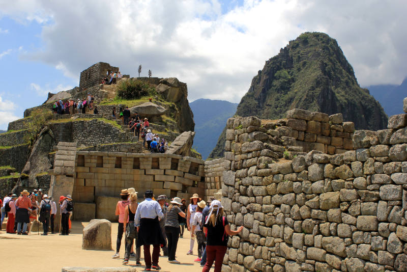 Tourists at Machu Picchu's main temple